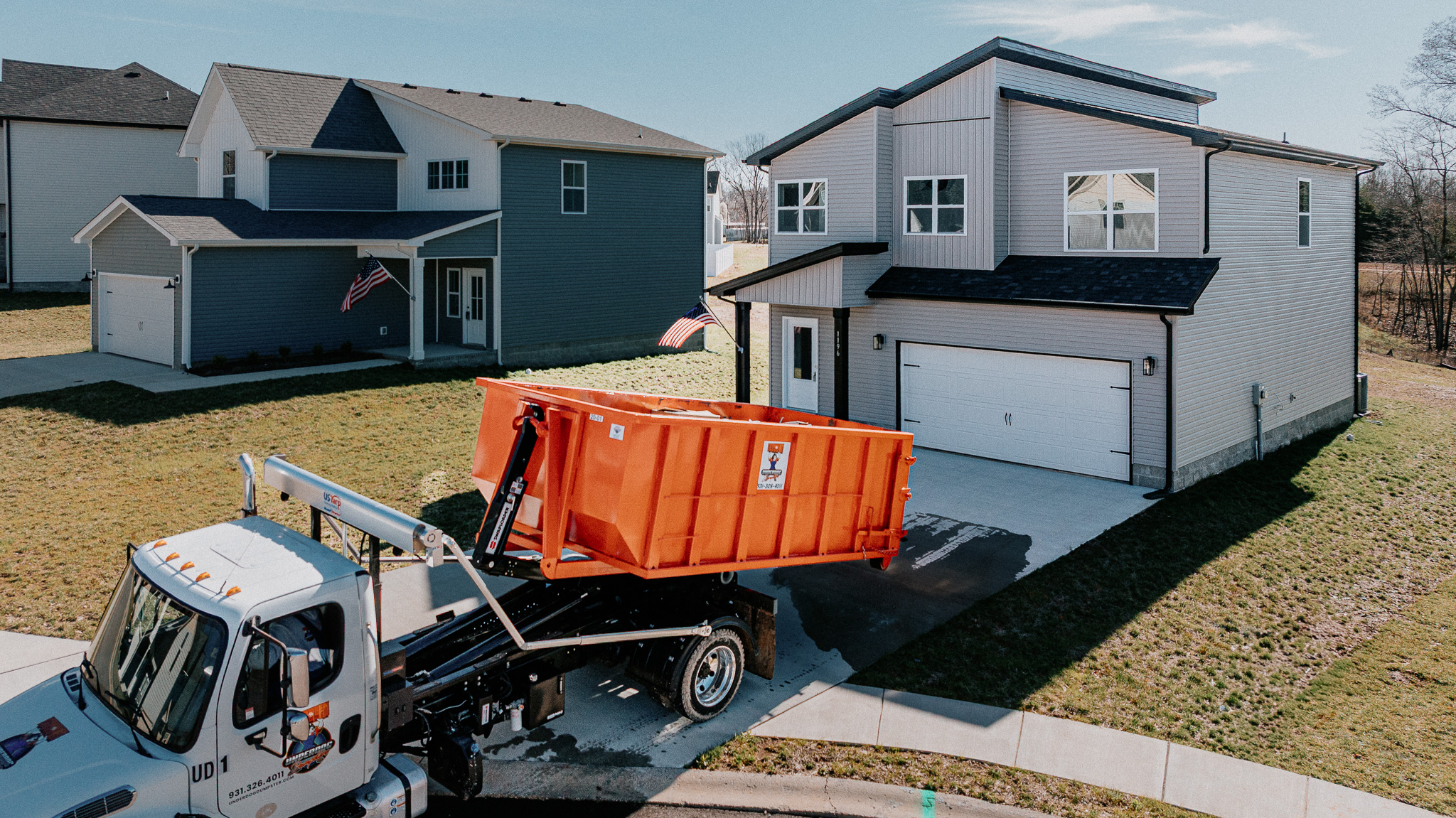 Truck with dumpster rental unit